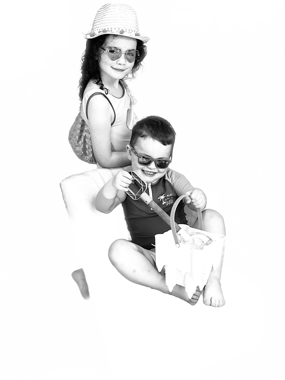 Ciara's submission to the Great British Photography Challenge shows her children, Ellie and Donovan, in beach gear in black and white.